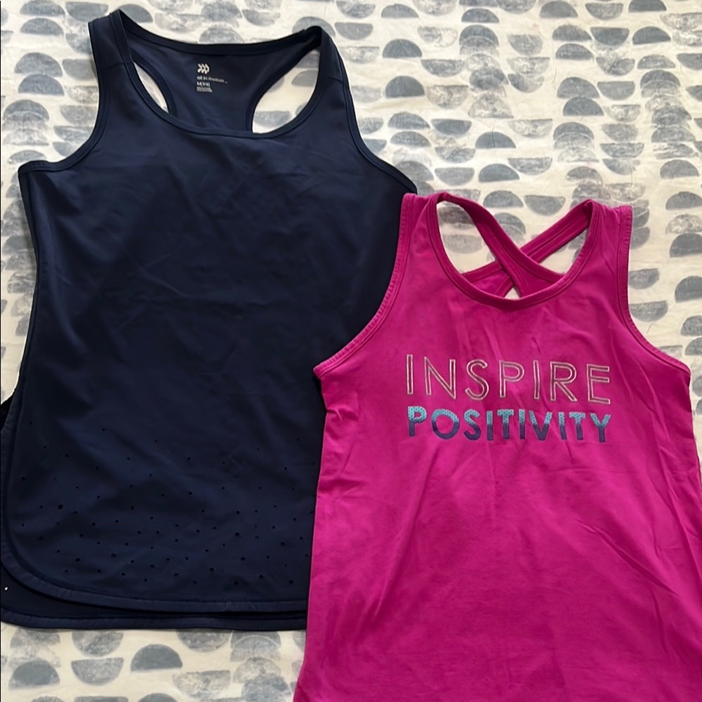 2 yoga style tanks